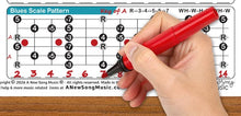 Load image into Gallery viewer, Dobro Resonator Resophonic Guitar Open G Tuning GBDGBD Major Minor Pentatonic Blues Mixolydian scale  Hand holding a red dry erase marker pen pointing to a music scale chart on a wooden surface