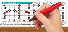 Load image into Gallery viewer, Lap Steel E Tuning EBEG#BE Scale Chart Major, Minor, Pentatonic, Mixolydian, Blues Scales Hand holding a dry erase red marker over a guitar scale pattern chart on a wooden surface